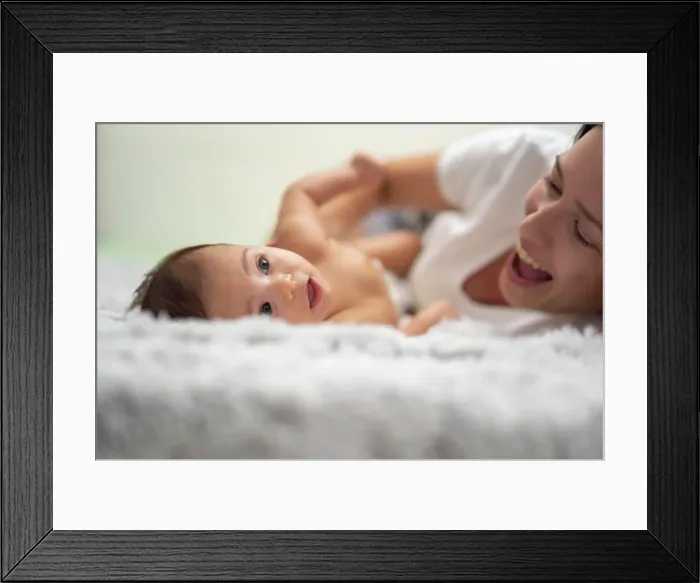 Framed Print : mother enjoying with her baby Framed Print : mother enjoying with her baby