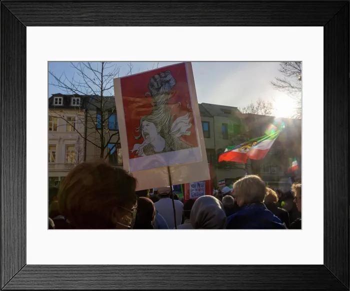 Framed Print : Protest for freedoms in Iran in the city center of Aachen. November 2022