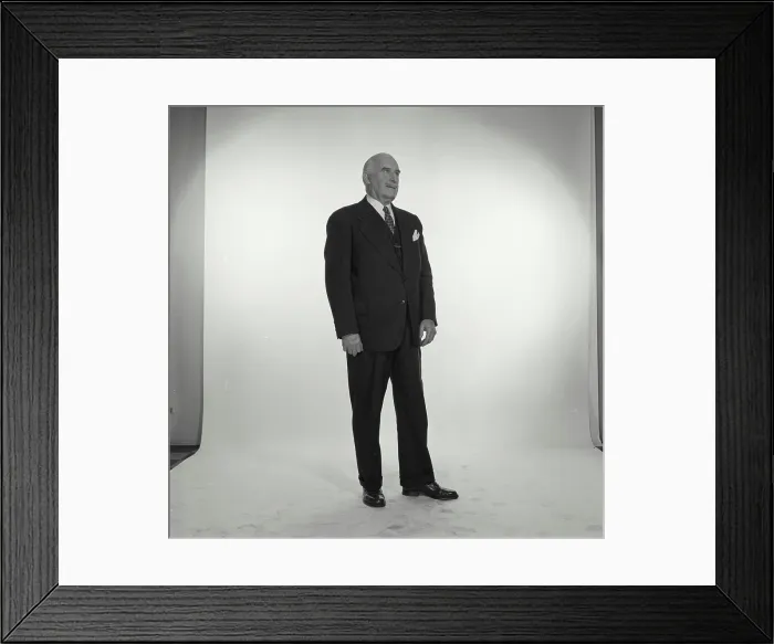 Framed Print : Close-up of a businessman standing