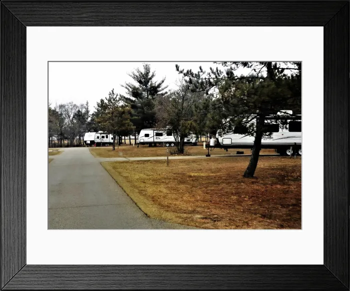 Framed Print : Recreational campers are parked March 30 Framed Print : Recreational campers are parked March 30