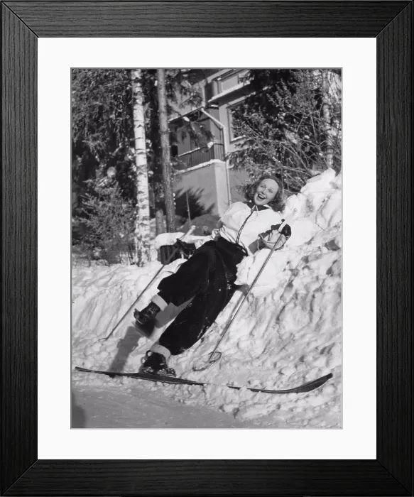 Framed Print : Winter in the 1940s. The young woman actress Inga Tidblad is dressed in the typical 1940s winter sports fashion Framed Print : Winter in the 1940s. The young woman actress Inga Tidblad is dressed in the typical 1940s winter sports fashion