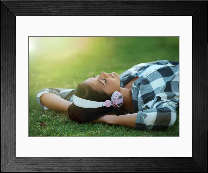 Framed Print : Music headphones, park or woman on lawn to relax for rest in garden Framed Print : Music headphones, park or woman on lawn to relax for rest in garden