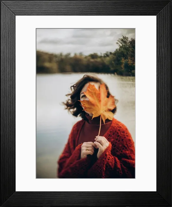 Framed Print : A young woman dreams in nature on a windy autumn day Framed Print : A young woman dreams in nature on a windy autumn day