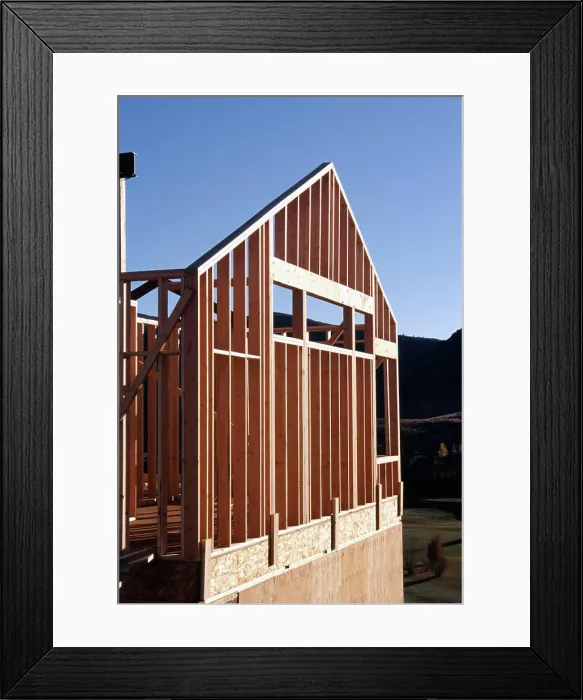 Framed Print : Low angle view of house under construction Framed Print : Low angle view of house under construction