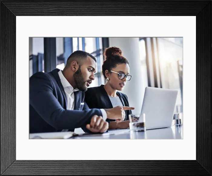 Framed Print : Business, people and solution with laptop in office for trial preparation