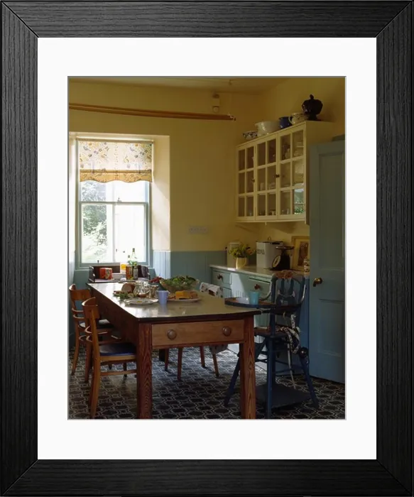 Framed Print : Pine table and chairs in cream and blue traditional kitchen with patterned flooring Framed Print : Pine table and chairs in cream and blue traditional kitchen with patterned flooring