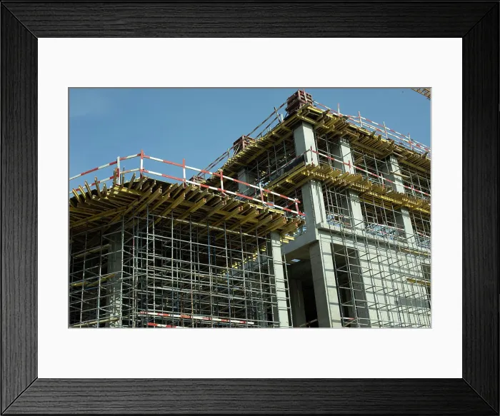 Framed Print : Building. Concrete and steel construction. Erection of walls of house Framed Print : Building. Concrete and steel construction. Erection of walls of house