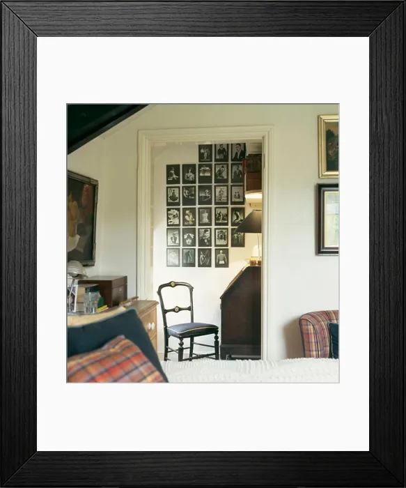 Framed Print : Townhouse bedroom with view through doorway of collection of black Framed Print : Townhouse bedroom with view through doorway of collection of black