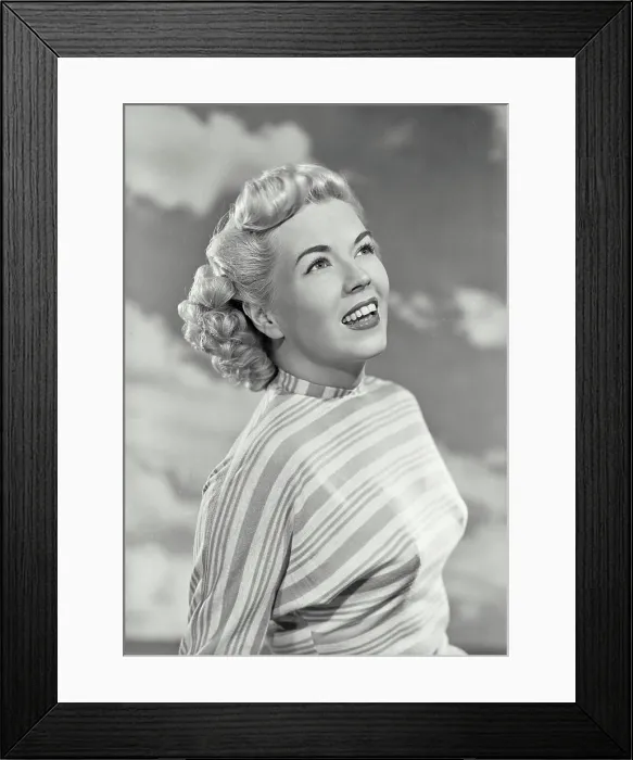 Framed Print : Vintage photograph. Portrait of woman in striped blouse smiling off camera Framed Print : Vintage photograph. Portrait of woman in striped blouse smiling off camera