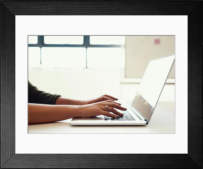 Framed Print : Person, hands and copywriting with laptop in closeup for news blog Framed Print : Person, hands and copywriting with laptop in closeup for news blog