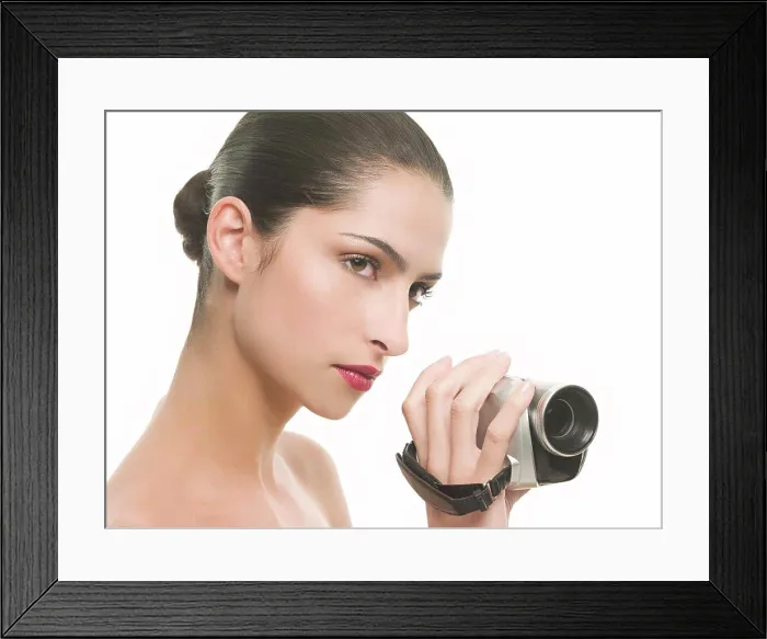 Framed Print : Woman with a video camera Framed Print : Woman with a video camera