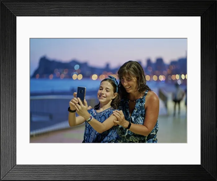 Framed Print : Portrait of mother and teenage daughter wearing blue dresses Framed Print : Portrait of mother and teenage daughter wearing blue dresses