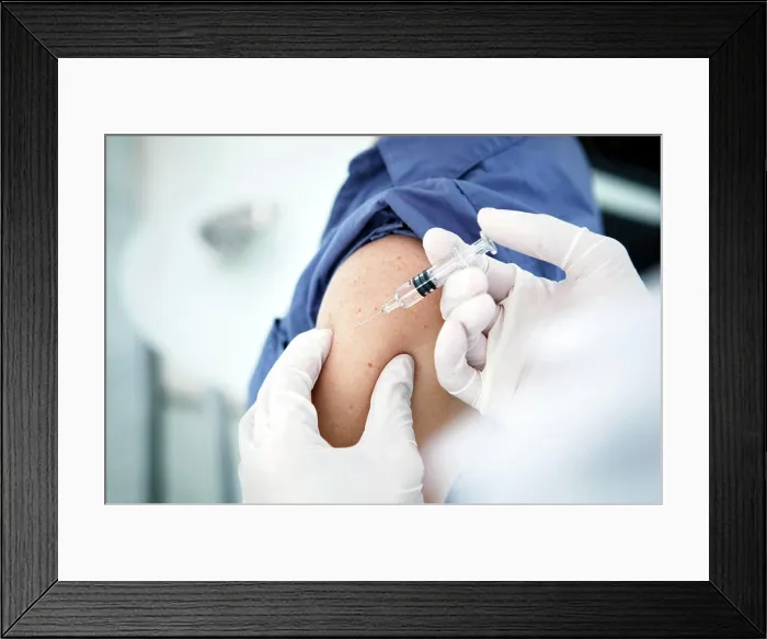 Framed Print : Vaccinating a woman Framed Print : Vaccinating a woman