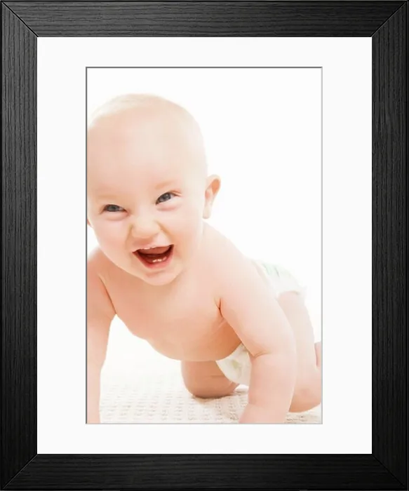 Framed Print : A laughing baby crawling Framed Print : A laughing baby crawling