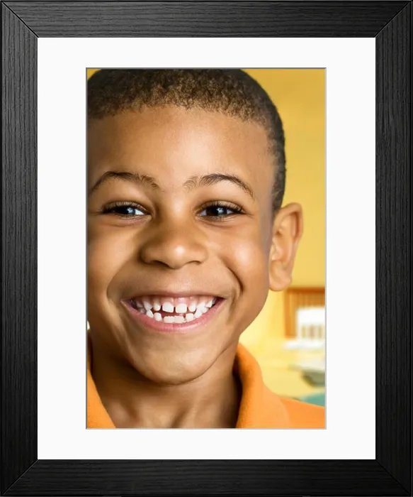 Framed Print : Portrait of a boy smiling Framed Print : Portrait of a boy smiling