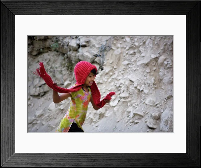 Framed Print : Girl running by taking his scarf Annapurna Nepal Framed Print : Girl running by taking his scarf Annapurna Nepal