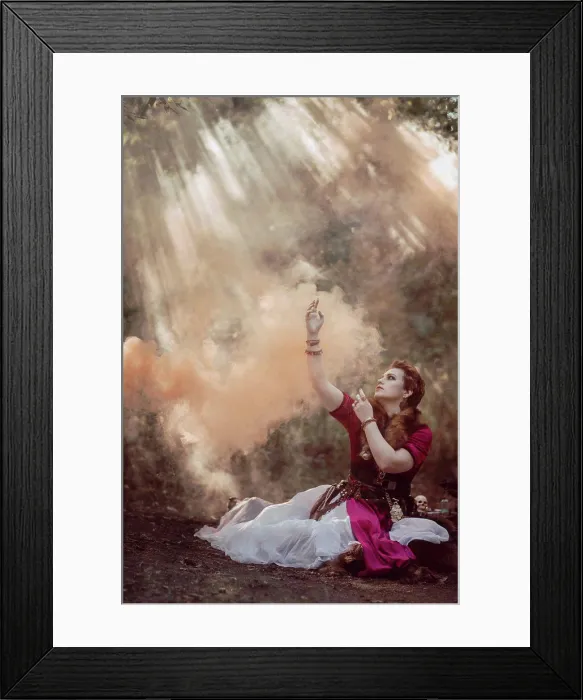 Framed Print : Witch with short hair in dress against the background of wild nature Framed Print : Witch with short hair in dress against the background of wild nature