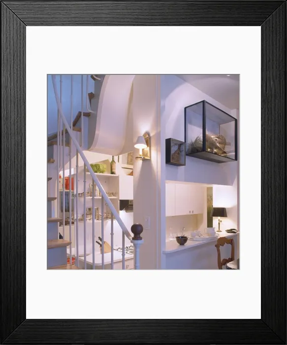 Framed Print : Modern white understairs kitchen with glass case on wall above hatch Framed Print : Modern white understairs kitchen with glass case on wall above hatch