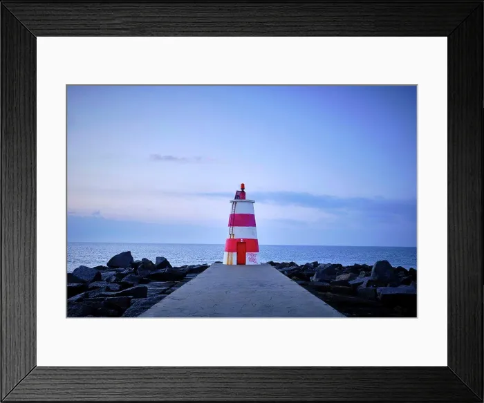Framed Print : A lighthouse off the coast of Portugal on an early January morning Framed Print : A lighthouse off the coast of Portugal on an early January morning