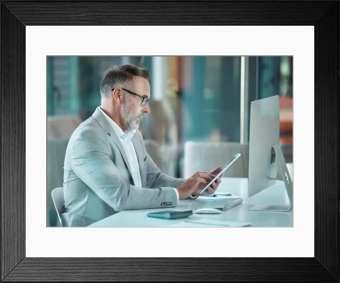 Framed Print : Tablet, computer and mature man in office with research Framed Print : Tablet, computer and mature man in office with research