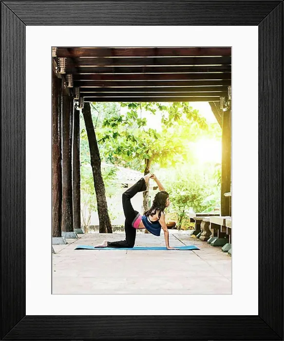 Framed Print : Woman doing quadriceps yoga outdoors, girl doing yoga and quadricep stretching fitness Framed Print : Woman doing quadriceps yoga outdoors, girl doing yoga and quadricep stretching fitness