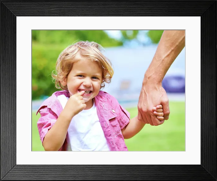 Framed Print : Holding hands, single parent or child in park for portrait Framed Print : Holding hands, single parent or child in park for portrait