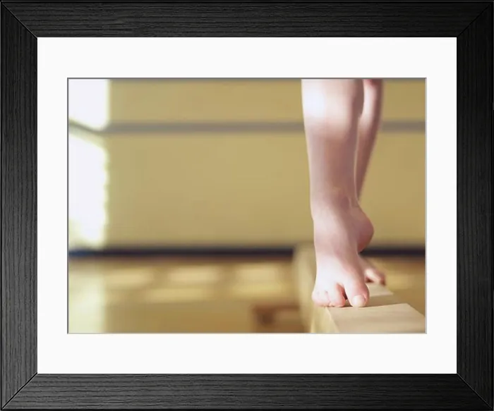 Framed Print : Low section view of a female gymnast standing Framed Print : Low section view of a female gymnast standing