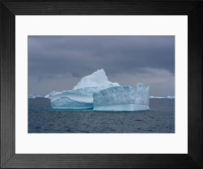 Framed Print : South Georgia Island. Sculpted blue icebergs floating in the Atlantic Framed Print : South Georgia Island. Sculpted blue icebergs floating in the Atlantic