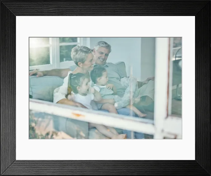 Framed Print : Window, sofa and grandparents and children watching tv Framed Print : Window, sofa and grandparents and children watching tv