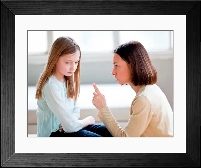 Framed Print : Mother scolding her 9 years old daughter Framed Print : Mother scolding her 9 years old daughter
