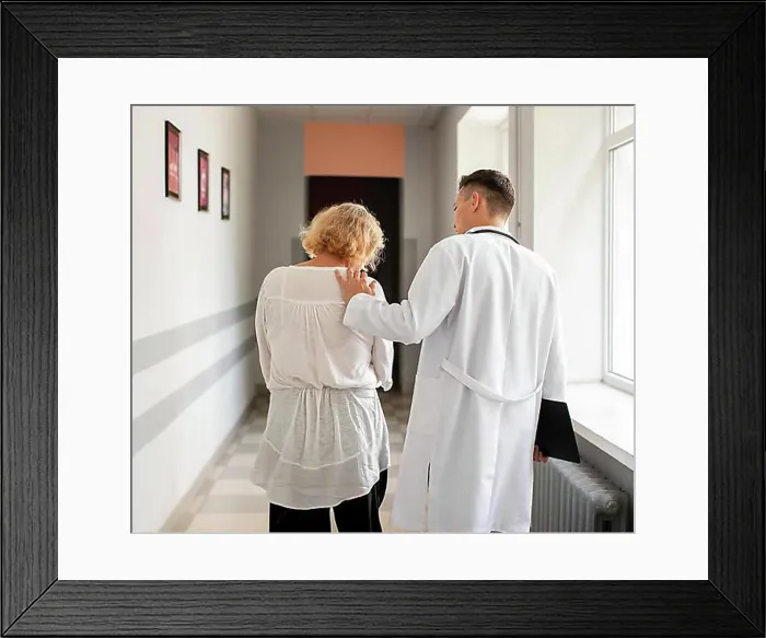 Framed Print : Back view senior patient doctor walking Framed Print : Back view senior patient doctor walking