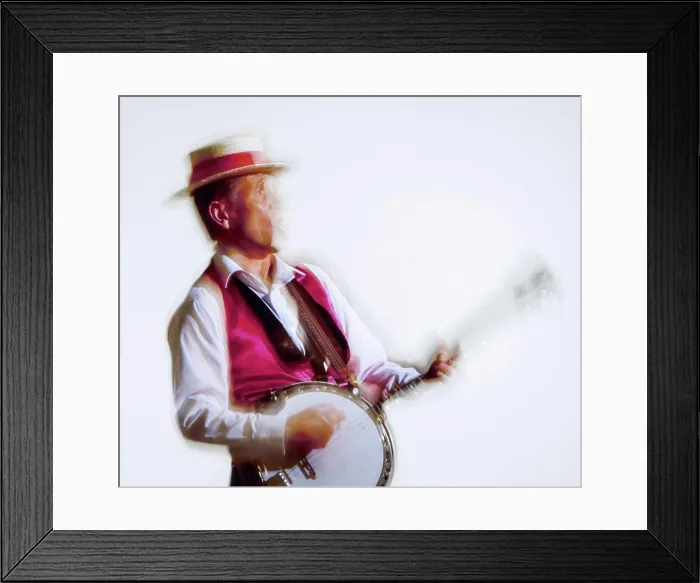 Framed Print : Close up of Dr Jazz playing his banjo and singing - blurred Framed Print : Close up of Dr Jazz playing his banjo and singing - blurred