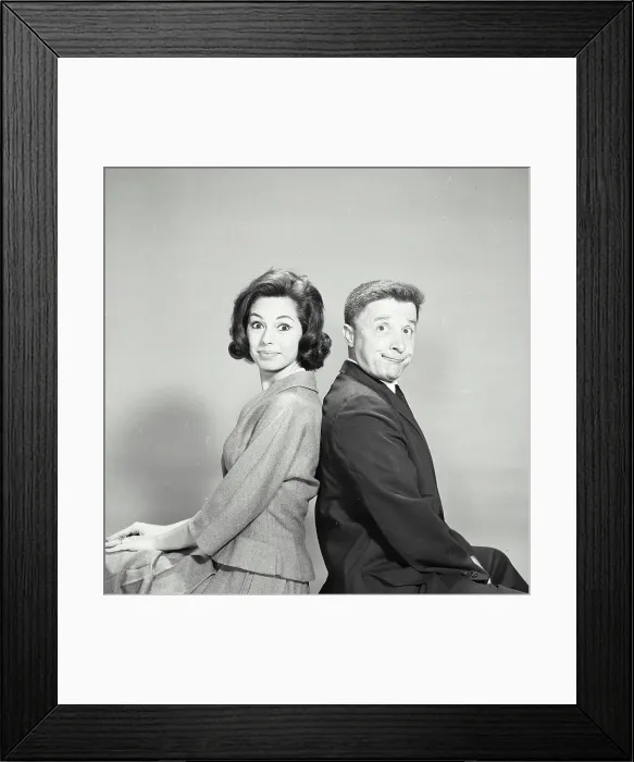 Framed Print : Vintage Photograph. Young couple back to back with smug expression Framed Print : Vintage Photograph. Young couple back to back with smug expression