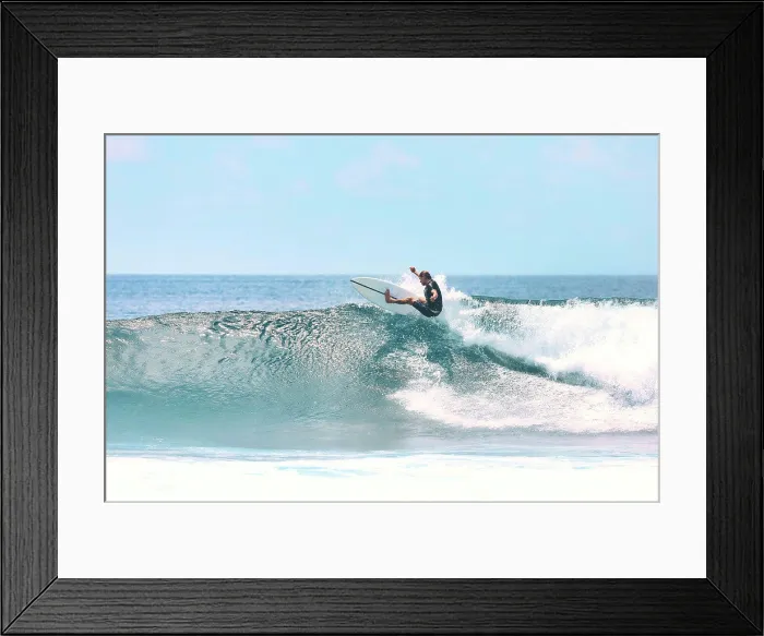 Framed Print : Male surfer on a wave at sunny day Framed Print : Male surfer on a wave at sunny day
