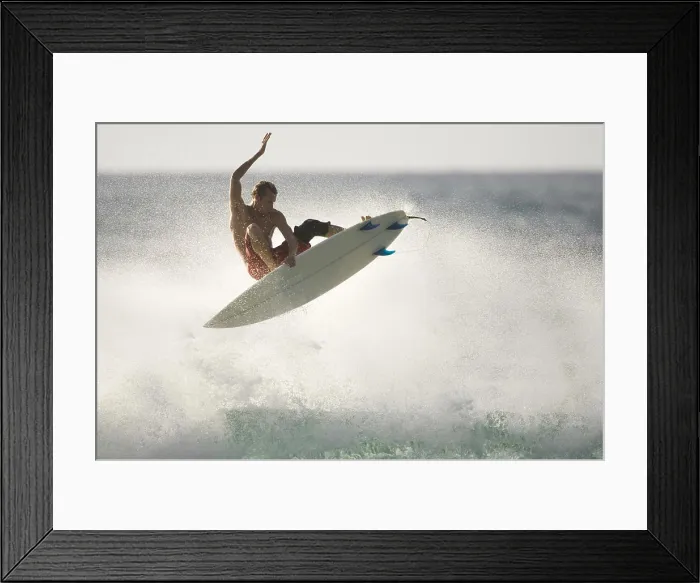 Framed Print : Surfer flying off wave, Oahu Framed Print : Surfer flying off wave, Oahu