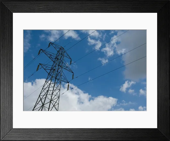 Framed Print : Electricity pylon against sky