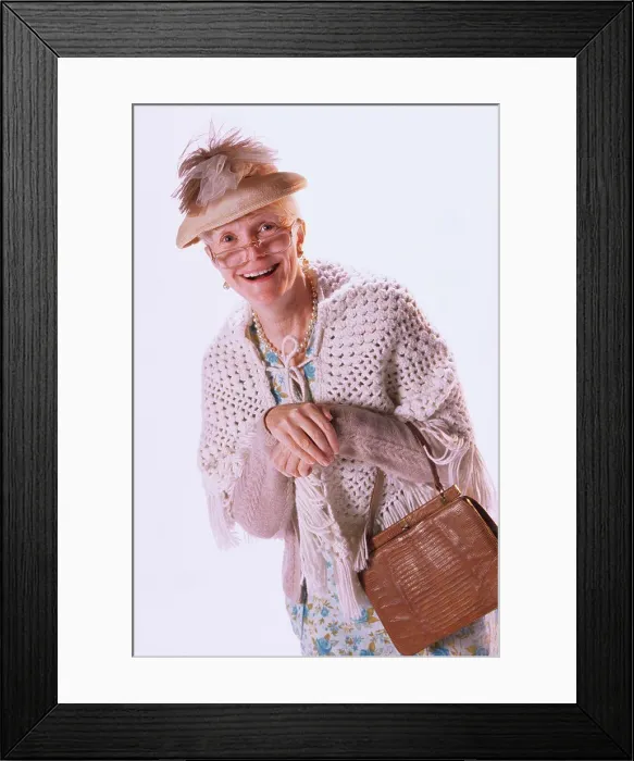 Framed Print : Portrait of a senior woman smiling Framed Print : Portrait of a senior woman smiling