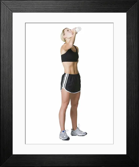 Framed Print : Profile of a young woman drinking water