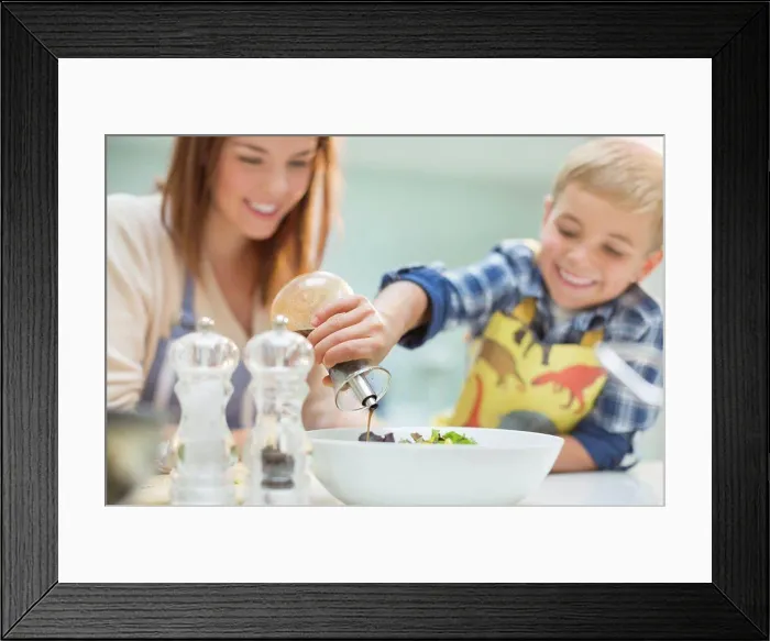 Framed Print : Mother and son making salad in kitchen, London, UK Framed Print : Mother and son making salad in kitchen, London, UK