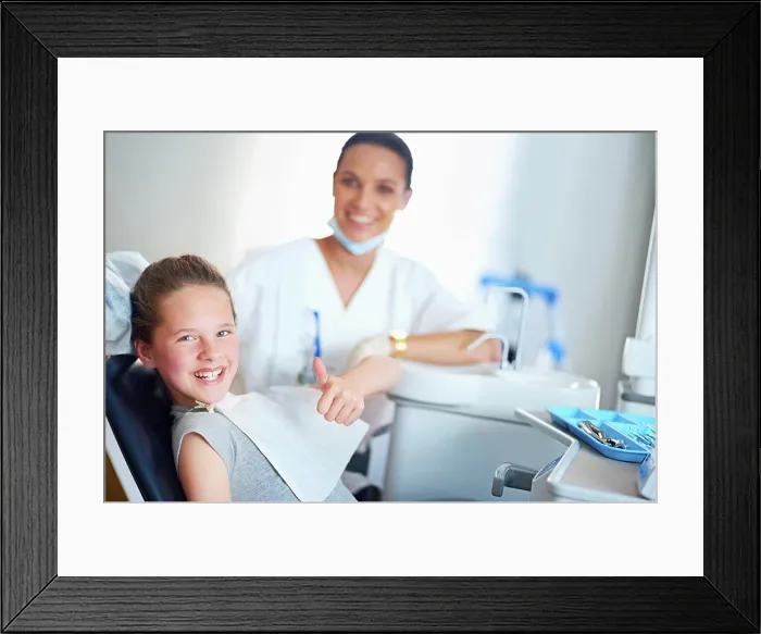 Framed Print : Thumbs up, dentist and portrait of child in chair for cleaning Framed Print : Thumbs up, dentist and portrait of child in chair for cleaning