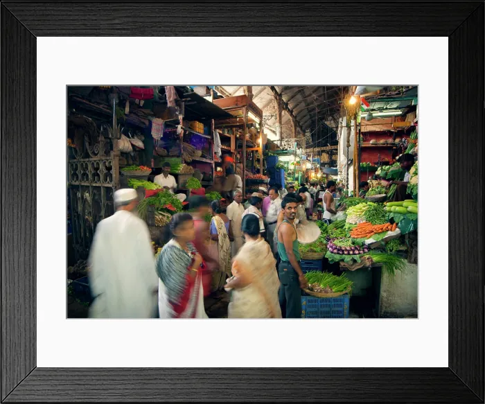 Framed Print : Bustling market scene with vibrant vegetable stalls and shoppers in motion