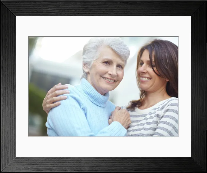 Framed Print : Happy, elderly mother and woman in backyard with smile Framed Print : Happy, elderly mother and woman in backyard with smile