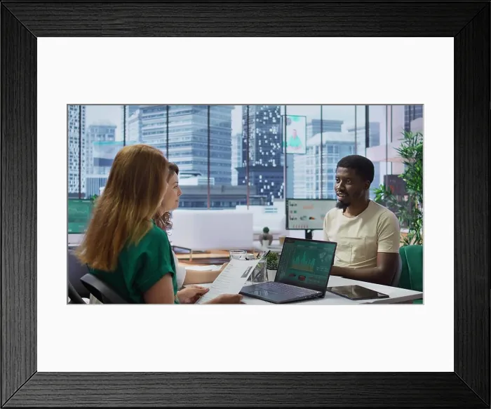 Framed Print : Professional businesswoman reviews the resume of a job candidate during formal interview Framed Print : Professional businesswoman reviews the resume of a job candidate during formal interview