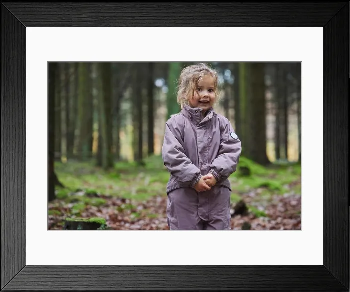 Framed Print : Beautiful child in the forest in Denmark