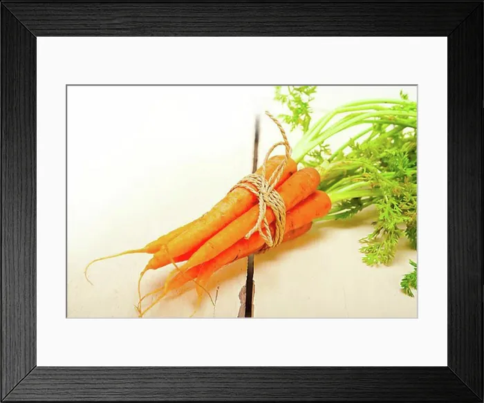 Framed Print : Fresh baby carrots bunch tied with rope on a rustic table Framed Print : Fresh baby carrots bunch tied with rope on a rustic table