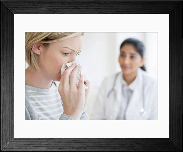 Framed Print : Woman blowing nose Framed Print : Woman blowing nose