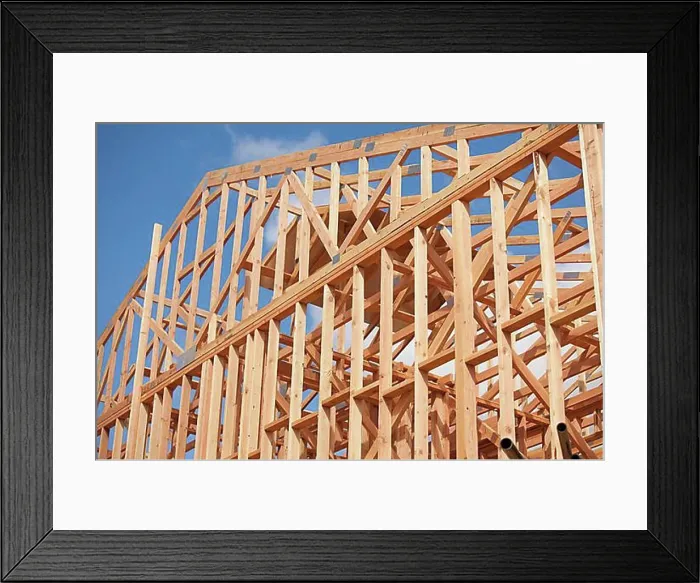 Framed Print : Wood home framing abstract at construction site Framed Print : Wood home framing abstract at construction site