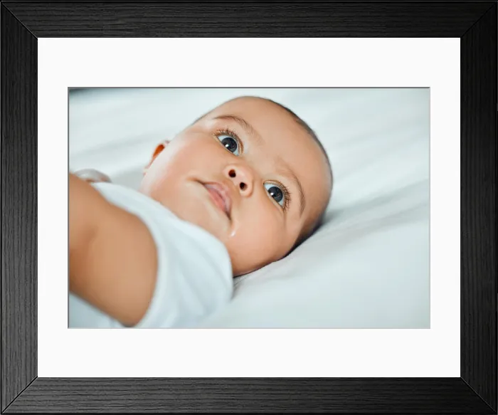 Framed Print : Baby, relax and thinking on bed in morning for health Framed Print : Baby, relax and thinking on bed in morning for health