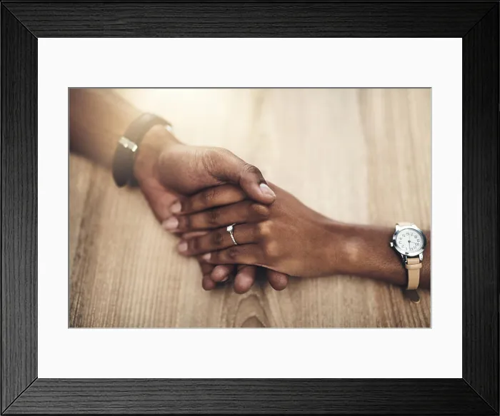 Framed Print : Marriage, support and people with holding hands on table for partnership Framed Print : Marriage, support and people with holding hands on table for partnership