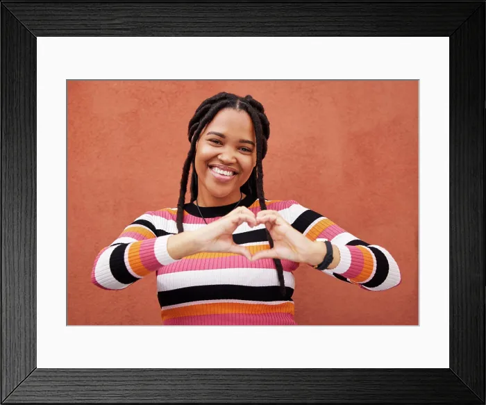 Framed Print : Happy, heart and portrait black woman by a wall in the city while on a walk on a weekend trip Framed Print : Happy, heart and portrait black woman by a wall in the city while on a walk on a weekend trip